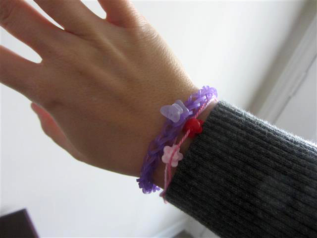 My youngest is SUPER into gift giving - if you come to my house for longer than 10 minutes she will be in her room making you something on the Rainbow Loom or drawing you a picture. She made me these "friendship bracelets" as a gift.