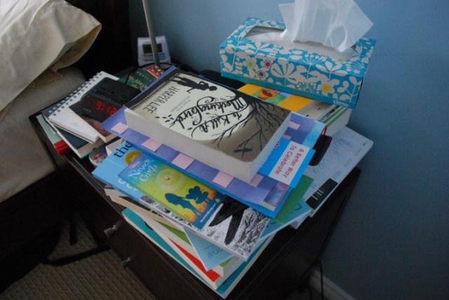 The horror that is my bedside table backlog. Not shown: overflow pile on the floor.