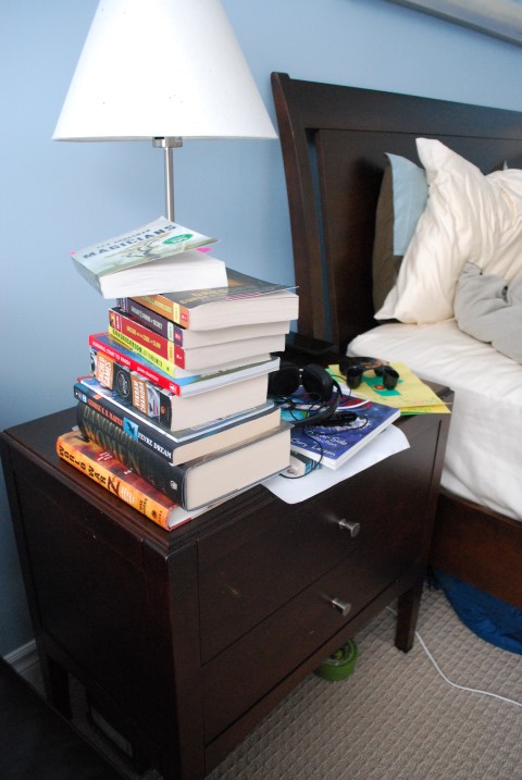 My husband's bedside table. These were all gifts from me.